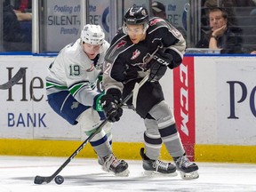 Justin Sourdif of the Vancouver Giants, right, was injured in Game 1 of the WHL playoffs against the Seattle Thunderbirds and his return to the lineup is unknown, according to coach Michael Dyck.



 action in Seattle on Tuesday, March 12. Justin Sourdif of the Giants, with puck, scored his 22nd goal of the WHL season in 5-1 win. Photo by Brian Liesse [PNG Merlin Archive]