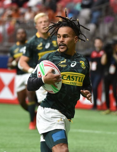 South Africas Selvyn Davids carries the ball against Chile  during World Rugby Sevens Series action in Vancouver, Canada, March 9, 2019.