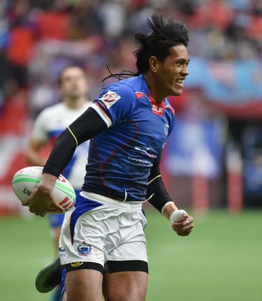 Samoa's John Vaili scores against France during World Rugby Sevens Series action in Vancouver on Sunday, March 10, 2019.