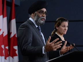 Federal Defence Minister Harjit Sajjan (left) and Foreign Affairs Minister Chrystia Freeland at an announcement in Ottawa on Monday, March 18, 2019.
