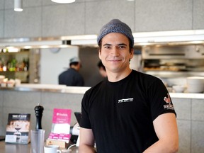 Chef Josef Driemel of Fable Diner cooks chicken and grits.