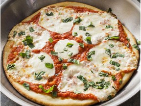 Skillet pizza, from the cookbook Bread Illustrated."