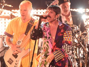 Flea, left, and Anthony Kiedis of Red Hot Chili Peppers perform onstage during the 61st Annual GRAMMY Awards at Staples Center on February 10, 2019 in Los Angeles, California. (Photo by Kevin Winter/Getty Images for The Recording Academy)