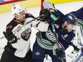 Vancouver Giants Jadon Joseph and Seattle Thunderbirds Matthew Wedman battle for position in front of the Thunderbirds net in the second period of Game 5 of their WHL first-round playoff series at Langley Events Centre Friday night.
