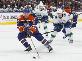 Troy Stecher and the Vancouver Canucks chased Connor McDavid and the Oilers, only to come up just short of the comeback in a 3-2 setback in Edmonton Thursday night.