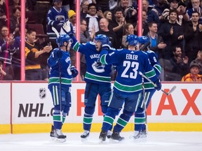 Bo Horvat celebrates his first of two goals Wednesday at Rogers Arena.