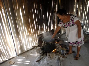A simple home kitchen on the Yucatan Peninsula. Pibil (meats wrapped in banana or plantain leaves and roasted in an earthen pit) is still a way of life, as are barbacoas (meats grilled outdoors over fire).