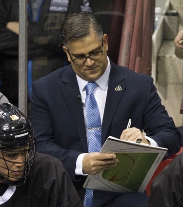 Vancouver Warriors head coach Chris Gill behind the bench during their regular season National Lacrosse League game against the New England Black Wolves at Rogers Arena on Saturday, March 16, 2019.