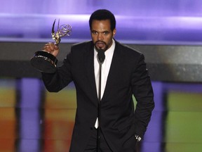 FILE - In this June 20, 2008, file photo Kristoff St. John accepts the award for outstanding supporting actor in a drama series for his work on "The Young and the Restless" at the 35th Annual Daytime Emmy Awards in Los Angeles. Officials say St. John died of heart disease, with heavy drinking at the time of his death as a contributing factor. A coroner's report released Tuesday lists "hypertrophic heart disease" as the cause of the 52-year-old's death on Feb. 4 at his home in Los Angeles. "Hypertrophic" means the heart muscle has become abnormally thick.