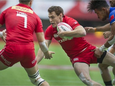 Canada's Phil Berna plays Samoa at BC Place Stadium during the 2019 HSBC Canada Sevens rugby tournament in Vancouver, Saturday, March 9, 2019.