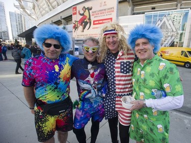 Fans (from left to right) Erich Friess, Frank Magdich, Mike Orr and Brendan Leyne at BC Place Stadium for the 2019 HSBC Canada Sevens rugby tournament in Vancouver Saturday, March 9, 2019.