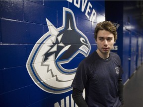 The newest Vancouver Canuck, Quinn Hughes, arrives at Rogers Arena on Wednesday.