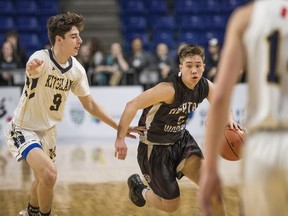 Chris Moon Heritage Woods Secondary School plays Kitsilano Secondary School on the first day of the B.C. High School Basketball Provincial Championships on March 6, 2019.
