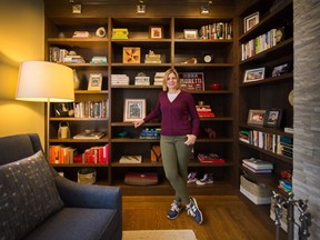 Vanda Borean in her Vancouver home, highlighted by newly decluttered shelves.