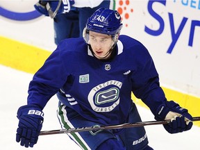 Defenceman Quinn Hughes works out with the Vancouver Canucks at Rogers Arena on Wednesday. He's expected to play Thursday against the visiting Los Angeles Kings.