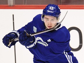 Vancouver Canucks defenceman Quinn Hughes skates during his first practice with the team at Rogers Arena on Wednesday. Thursday, he'll make his NHL debut.