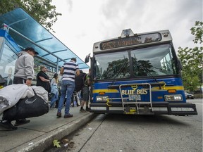 A Blue Bus picks up passengers outside Park Royal shopping centre in West Vancouver.