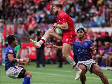 Canada's Isaac Kaay (8) jumps for the ball against Samoa during World Rugby Sevens Series action in Vancouver, B.C., on Saturday March 9, 2019.