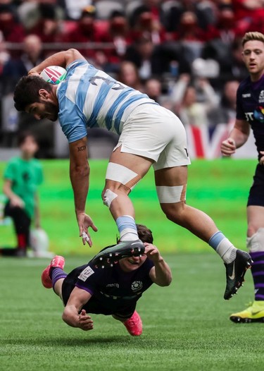 Argentina's German Schulz (3) jumps over Scotland's Max McFarland (11) during World Rugby Sevens Series action in Vancouver, B.C., on Saturday March 9, 2019.