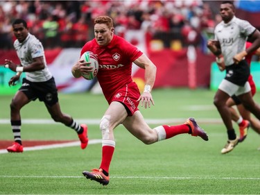 Canada's Connor Braid (6) runs the ball against Fiji during World Rugby Sevens Series action in Vancouver, B.C., on Saturday, March 9, 2019.