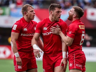 Canada's Harry Jones (11), Adam Zaruba (12) and Isaac Kaay (8) react after defeating Fiji during World Rugby Sevens Series action in Vancouver, B.C., on Saturday, March 9, 2019.