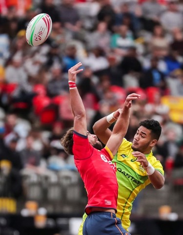 Australia's Jeral Skelton (9) leaps for the ball against Spain's Manuel Sainz-Trapaga (5) during World Rugby Sevens Series action in Vancouver, B.C., on Saturday March 9, 2019.