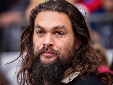 Actor Jason Momoa watches New Zealand play Argentina during World Rugby Sevens Series action in Vancouver on Sunday, March 10, 2019.