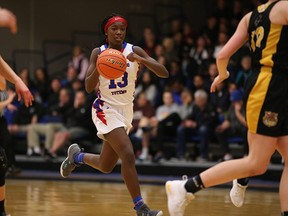 Deja Lee brings the ball up the court for Semiahmoo on Friday night against Kelowna.