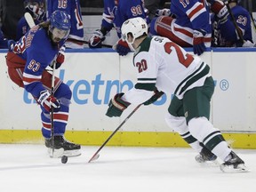 Mika Zibanejad of the New York Rangers, left, has put together an impressive season for the rebuilding New York Rangers. The Blueshirts play the Canucks Wednesday night in Vancouver.