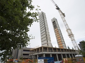 A new building is being built at the University of British Columbia campus in Vancouver, B.C., Monday, June, 13, 2016. The 18-storey Brock Commons is intended to show developers and the public that wood can be equally as effective as steel or concrete, better for the environment and support the country's forestry industry.