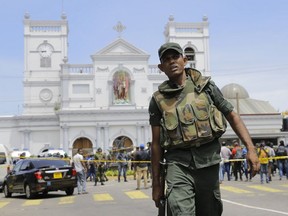 Sri Lankan Army soldiers secure the area around St. Anthony's Shrine after a blast in Colombo, Sri Lanka, on Sunday, April 21, 2019.