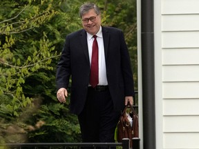 U.S. Attorney General William Barr leaves his home in McLean, Va., on Thursday morning, April 18, 2019.