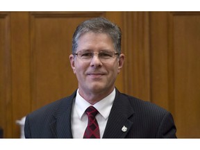 Conservative MP Mark Warawa takes his seat before appearing before the Commons house affairs committee to discuss motion, Wednesday March 27, 2013 in Ottawa. Warawa says he is undergoing tests to determine if he has pancreatic cancer and, if so, how far the disease may have spread.