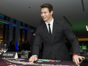 Canucks winger Nikolay Goldobin deals blackjack at the club's annual fundraiser, the Dice & Ice Gala, in February 2019.