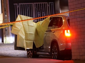 Vancouver police investigated in the area of West 4th Avenue and Burrard Street where a male was found shot dead inside a white SUV. Multiple bullet-holes riddled the vehicle's windshield.