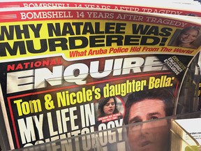National Enquirer magazines are displayed for sale alongside other tabloids at the checkout counter of a grocery store on April 11, 2019 in Chicago. (Scott Olson/Getty Images)