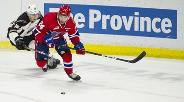 Vancouver Giant Davis Koch skates after Spokane Chief Ty Smith in Game 5 of the WHL Western Conference Championship in Langley April 26, 2019.