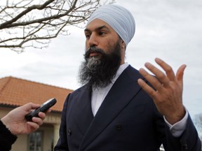 Federal NDP Leader Jagmeet Singh speaks with a reporter outside the Fogolar Furlan Club during a visit to his "hometown" of Windsor on Saturday, April 13, 2019.