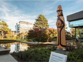 The Langara College campus is pictured in this undated file photo. The school's Musqueam House Post is also pictured. The 14-foot post serves as a welcome to all who come to Langara; it was carved by Musqueam artist Brent Sparrow Jr. and installed on campus in September 2018.