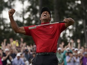 Tiger Woods reacts as he wins the Masters golf tournament on Sunday, April 14, 2019, in Augusta, Ga.