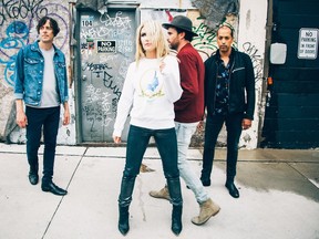 Metric (left to right): Joules Scott-Key on drums, vocalist Emily Haines, guitarist James Shaw and Joshua Winstead on bass.