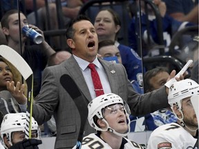 Coach Bob Boughner behind the bench of the Florida Panthers during an Oct. 6, 2018 NHL game in Tampa, Fla.