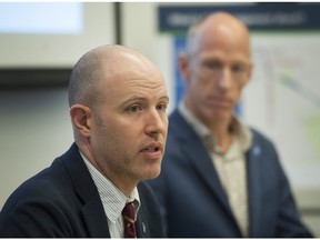 Surrey-Langley SkyTrain project director Jeff Busby (left) and TransLink vice-president of policy and planning Geoff Cross give a technical briefing to the media on Thursday in New Westminster.