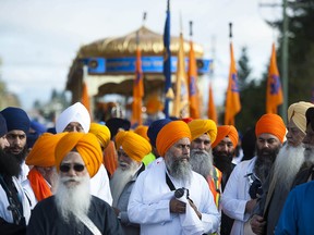 People take part in the annual Vaisakhi parade in Surrey, April 20, 2019. Hundreds of thousands of people attend the Sikh festival every year. Surrey’s Vaisakhi parade is one of the largest outside of India.