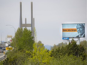 An Alex Fraser Bridge billboard the Liberals are responsible for blames Premier John Horgan for the recent high gas prices.
