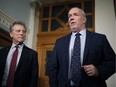 B.C. Premier John Horgan and Minister of Environment and Climate Change Strategy George Heyman (left) at the legislature in Victoria in February 2018.