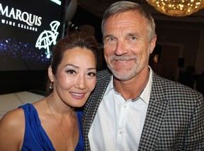 FASHION FORWARD: Businessman Michael Schultz accompanied Carol Song to the fashion fete. Schultz, along with entrepreneur Frank Giustra, matched funds raised during the ‘man walk’ when men were invited to support the cause. Photo by Fred Lee.