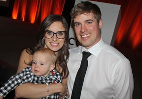 Harriet Ronoghan, Courage to Come Back awardee in the physical rehabilitation category, with her husband Tyler and son Charlie at the annual fundraising dinner.