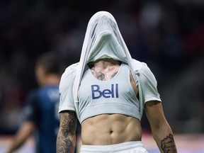 Vancouver Whitecaps' Joaquin Ardaiz covers his head with his jersey after a missed scoring chance against the Los Angeles Galaxy during the second half of an MLS soccer game in Vancouver, on Friday April 5, 2019. THE CANADIAN PRESS/Darryl Dyck