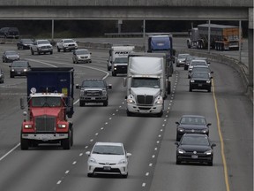Cars and trucks travel on Interstate Highway 5 near Olympia, Wash., Monday, March 25, 2019. Democrats in the Washington House released their two-year transportation budget proposal Monday, which includes $9.9 billion in spending for projects. (AP Photo/Ted S. Warren) ORG XMIT: WATW104